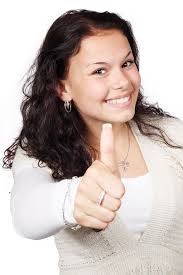 Woman with her thumbs up