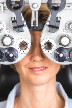 Woman getting her eyes examined